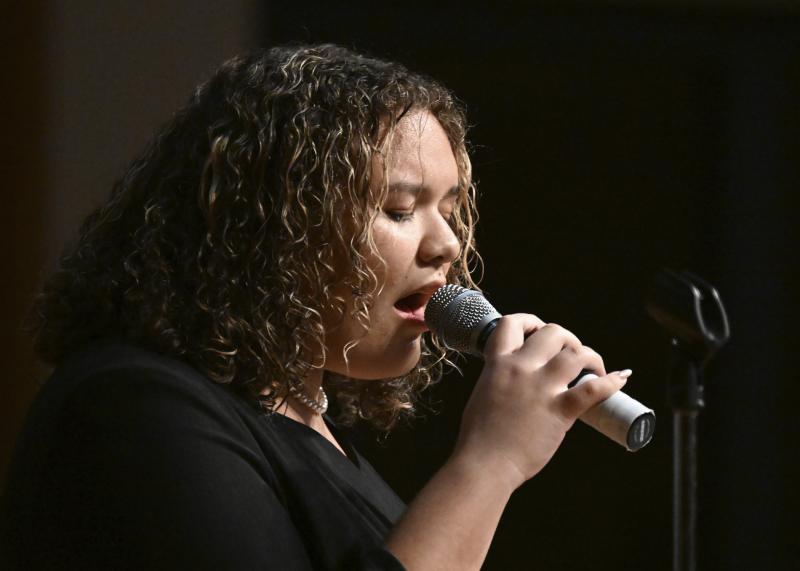 Caliana Velasquez, a student at Sussex Technical High School and a Lee Mitchell Scholarship recipient, sings a solo performance.